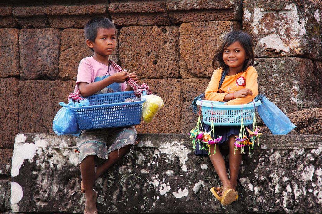 Children in Siem Reap Selling Souvenirs, they speak different languages