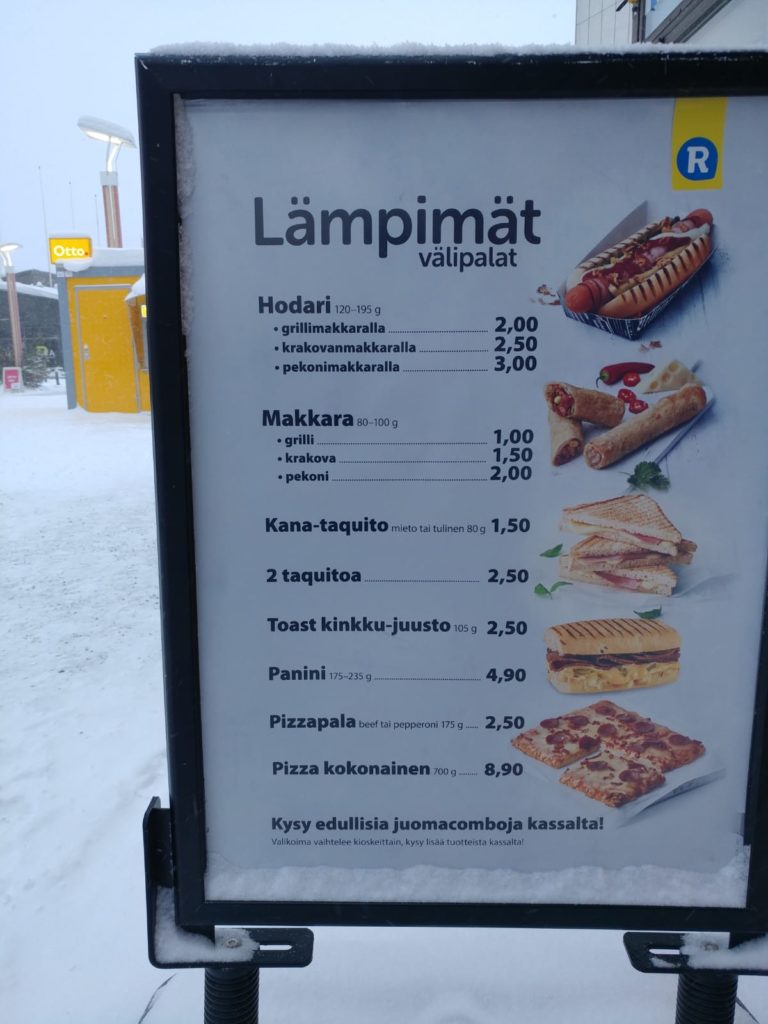 Prices of convenience store food in Rovaniemi, sanwiches, paninis, pizza and hot dogs, Should I pay a Travel Agent for Rovaniemi