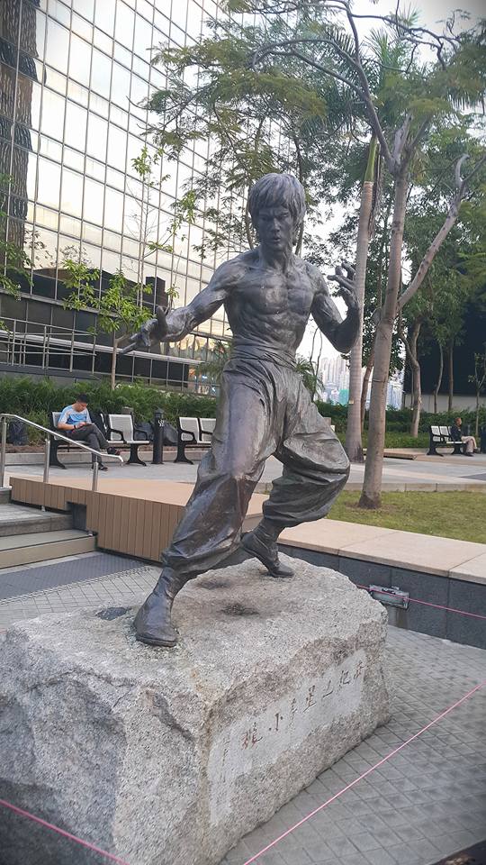 A statue of Bruce lee in the avenue of stars in Hong Kong